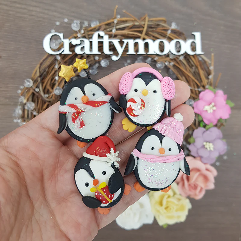 Christmas penguins - Embellishment Clay Bow Centre