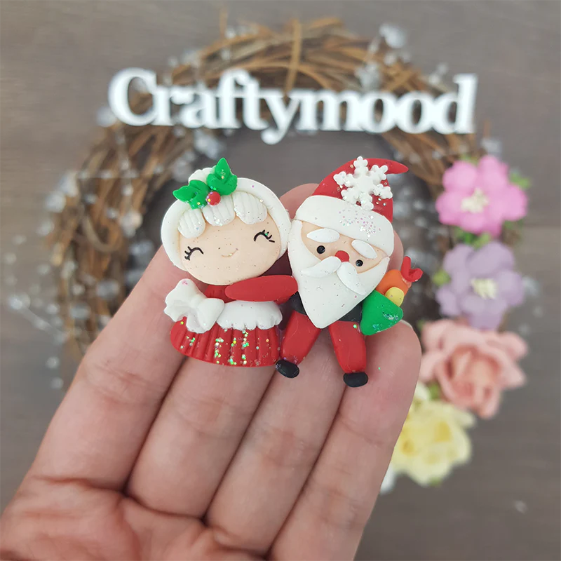 Christmas Santa couple - Embellishment Clay Bow Centre