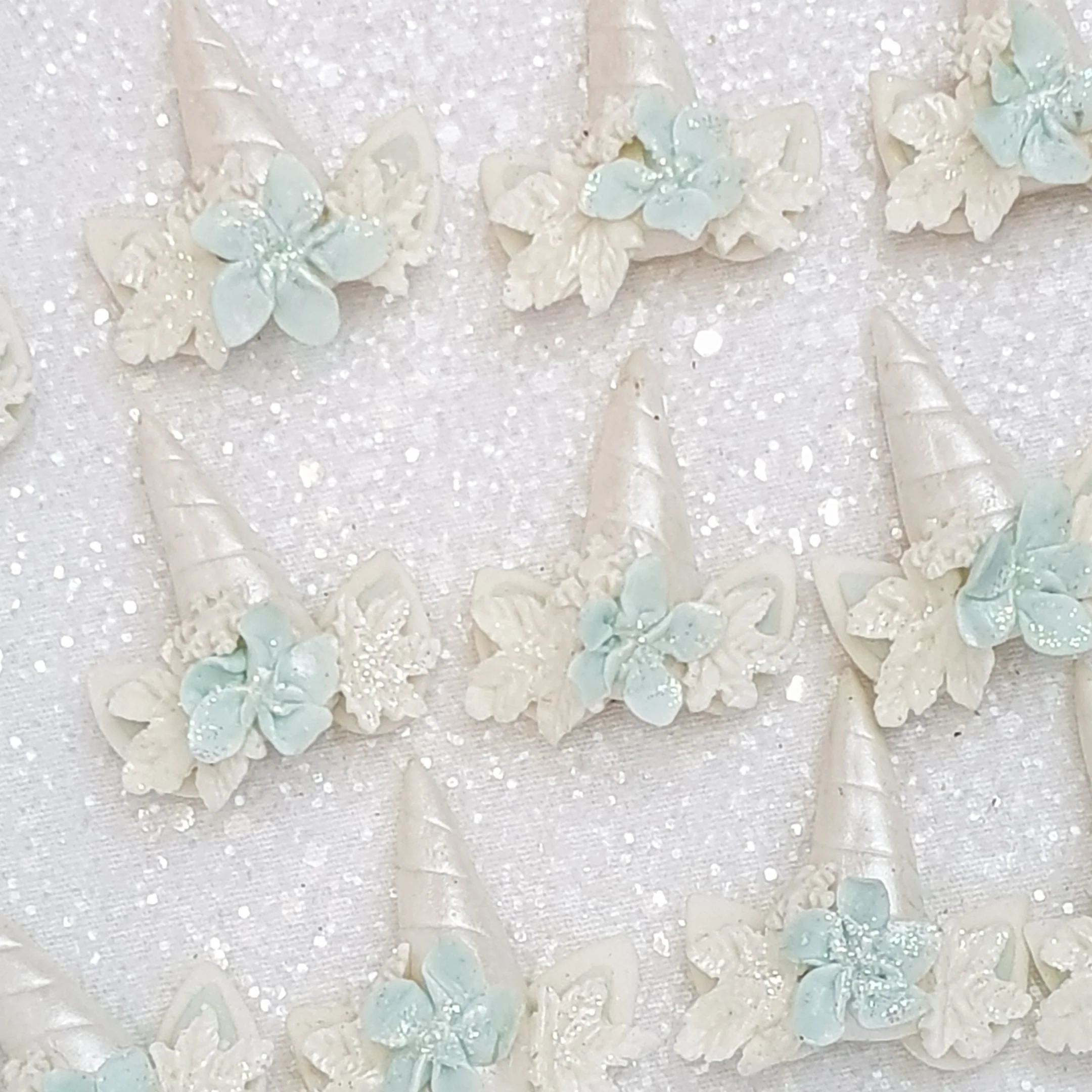 Christmas Unicorn Horn D- Handmade Flatback Clay Bow Centre