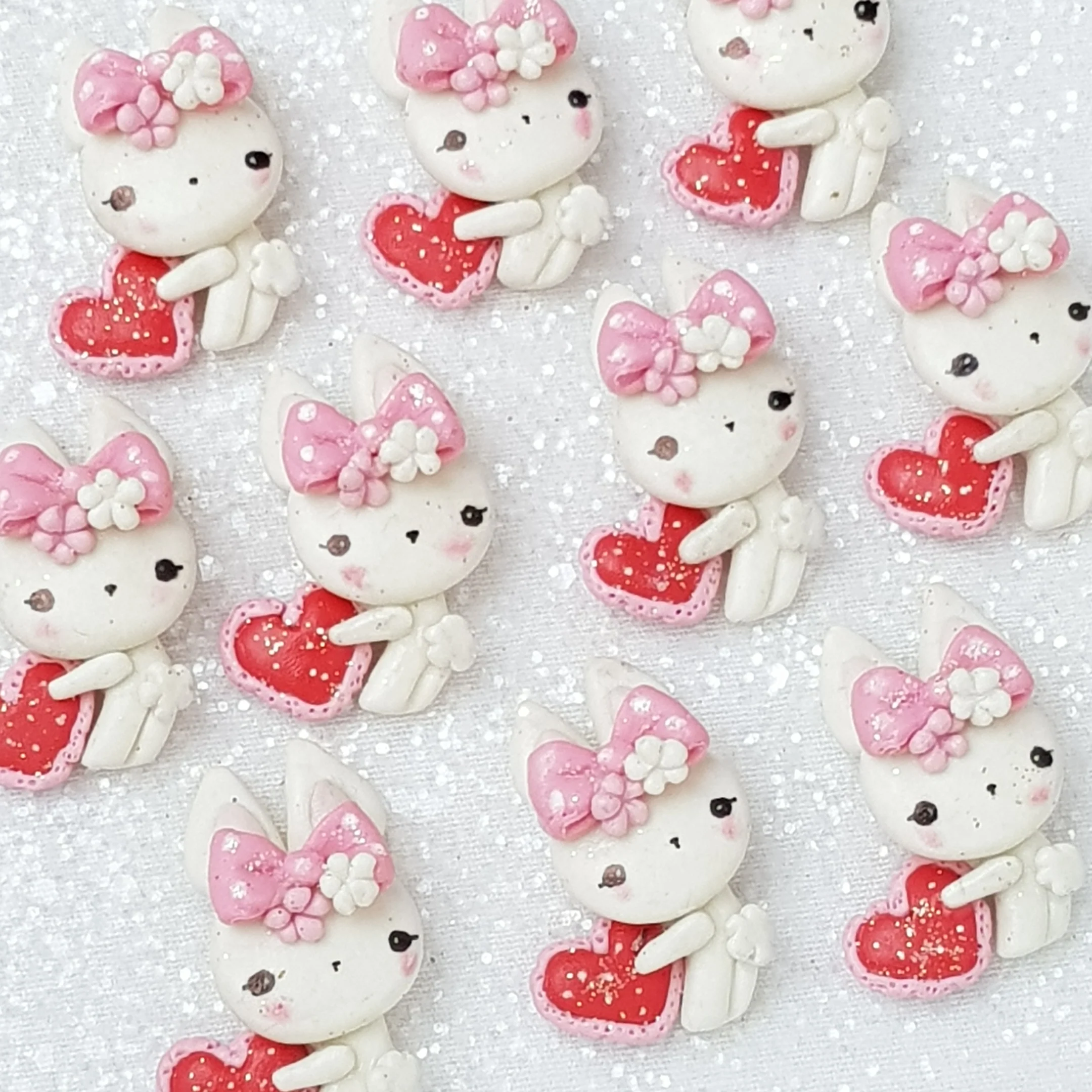 Sweet bunny holding heart - Handmade Flatback Clay Bow Centre